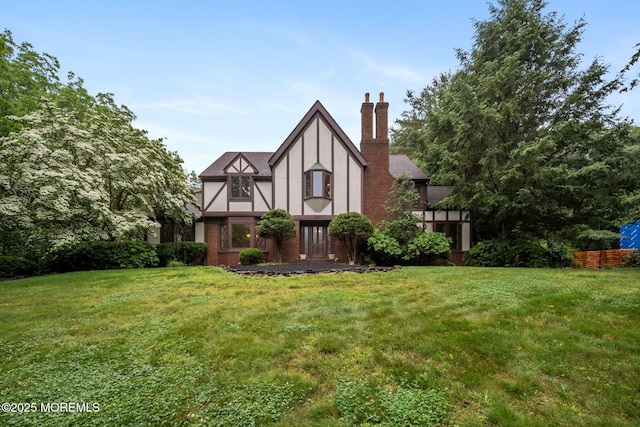 245 Borden Rd, Middletown, NJ 07748 - view of front facade with a front yard and a chimney