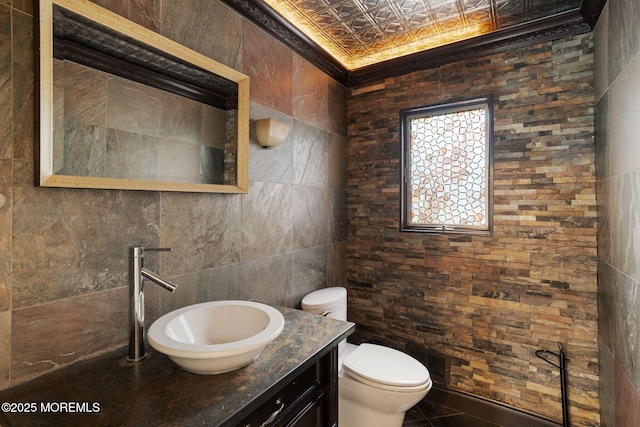 245 Borden Rd, Middletown, NJ 07748 - bathroom with an ornate ceiling, vanity, toilet, and tile walls