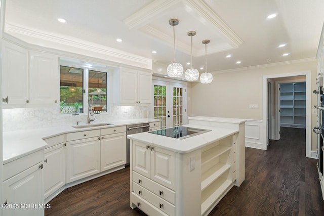 245 Borden Rd, Middletown, NJ 07748 - kitchen featuring a sink, black electric cooktop, ornamental molding, a center island, and dark wood-type flooring
