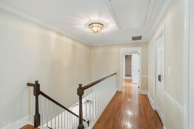 245 Borden Rd, Middletown, NJ 07748 - hallway with attic access, an upstairs landing, wood-type flooring, and ornamental molding