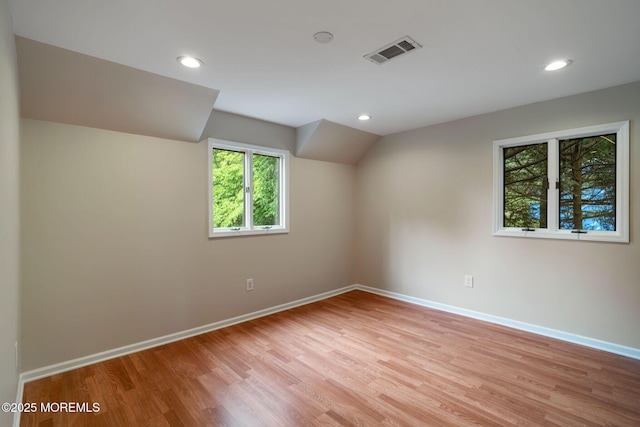 245 Borden Rd, Middletown, NJ 07748 - bonus room featuring light wood-style flooring, baseboards, recessed lighting, and vaulted ceiling