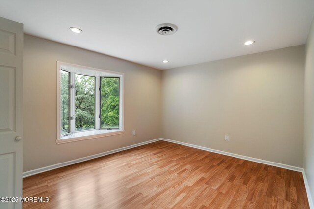 245 Borden Rd, Middletown, NJ 07748 - empty room with baseboards, light wood-style floors, and recessed lighting