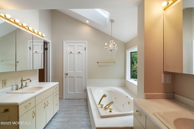 245 Borden Rd, Middletown, NJ 07748 - full bath with a skylight, two vanities, a tub with jets, a chandelier, and high vaulted ceiling