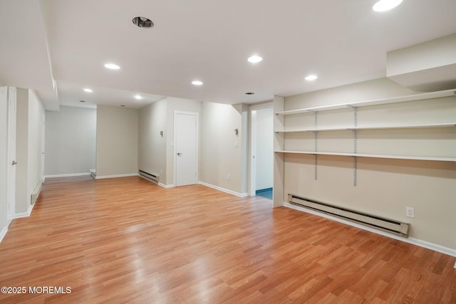 245 Borden Rd, Middletown, NJ 07748 - spare room featuring a baseboard heating unit, light wood-style flooring, baseboards, and recessed lighting