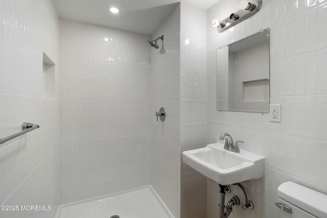 245 Borden Rd, Middletown, NJ 07748 - bathroom with a stall shower, toilet, and tile walls