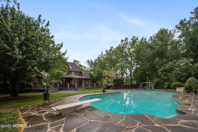 245 Borden Rd, Middletown, NJ 07748 - outdoor pool featuring a diving board and a patio area
