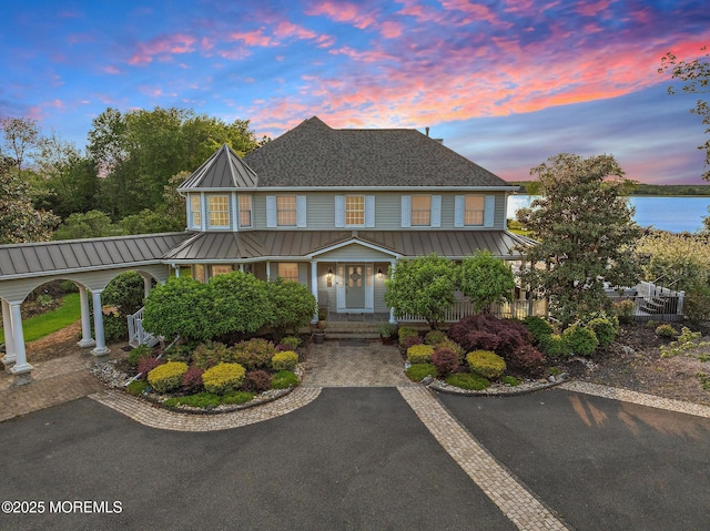 1413 Gully Rd, Wall, NJ 07719 - view of front of home featuring a standing seam roof, covered porch, and metal roof