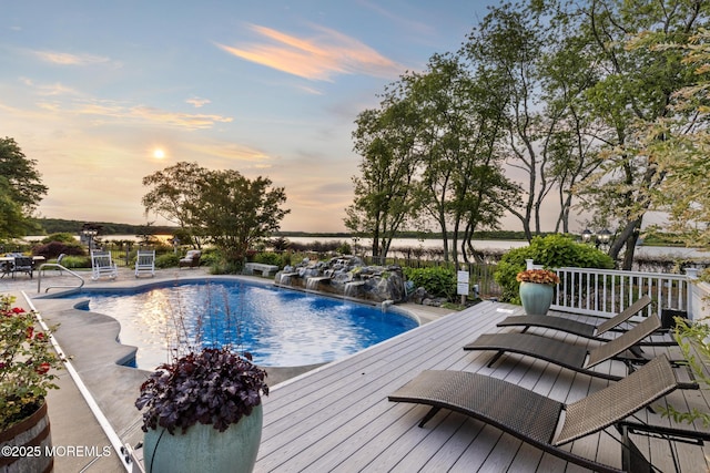 1413 Gully Rd, Wall, NJ 07719 - pool at dusk featuring an outdoor pool and a deck