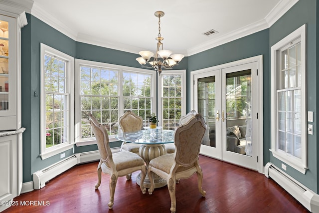 1413 Gully Rd, Wall, NJ 07719 - dining space with a baseboard heating unit, french doors, a chandelier, healthy amount of natural light, and crown molding