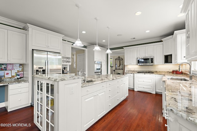 1413 Gully Rd, Wall, NJ 07719 - kitchen featuring a sink, stainless steel appliances, a center island, ornamental molding, and white cabinetry