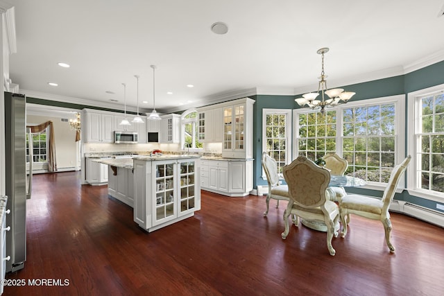 1413 Gully Rd, Wall, NJ 07719 - kitchen featuring appliances with stainless steel finishes, a chandelier, ornamental molding, white cabinetry, and a kitchen island