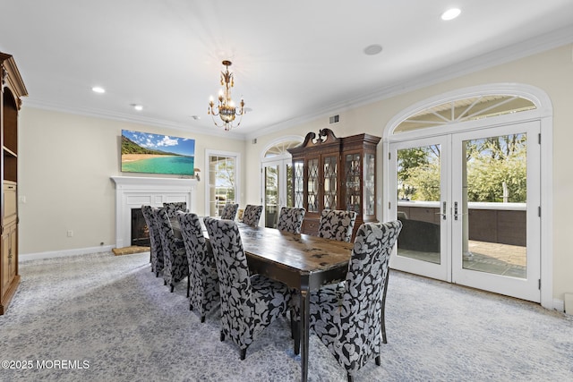 1413 Gully Rd, Wall, NJ 07719 - dining area with french doors, light carpet, ornamental molding, a chandelier, and recessed lighting