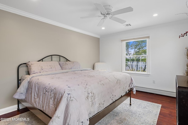 1413 Gully Rd, Wall, NJ 07719 - bedroom featuring baseboard heating, crown molding, wood finished floors, recessed lighting, and baseboards