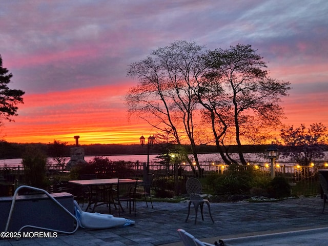 1413 Gully Rd, Wall, NJ 07719 - patio terrace at dusk with a patio area