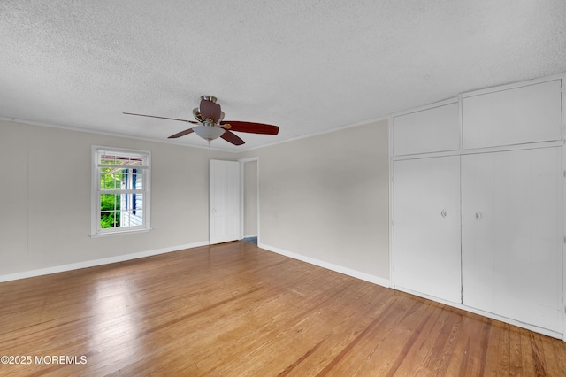 105 Cedar Grove Rd, Toms River, NJ 08753 - unfurnished bedroom with a textured ceiling, light wood-style flooring, a closet, ceiling fan, and ornamental molding