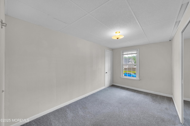 105 Cedar Grove Rd, Toms River, NJ 08753 - carpeted spare room featuring baseboards and a paneled ceiling