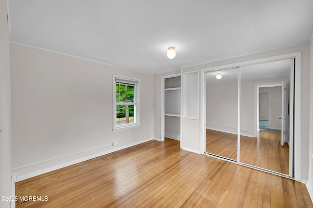 105 Cedar Grove Rd, Toms River, NJ 08753 - unfurnished bedroom featuring multiple closets and light wood-type flooring