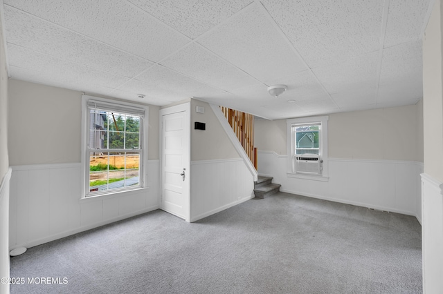 105 Cedar Grove Rd, Toms River, NJ 08753 - basement featuring a wainscoted wall, carpet, stairway, cooling unit, and a paneled ceiling