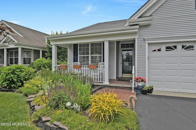 21 Blyth Ln, Jackson, NJ 08527 - entrance to property with a porch, roof with shingles, and a garage