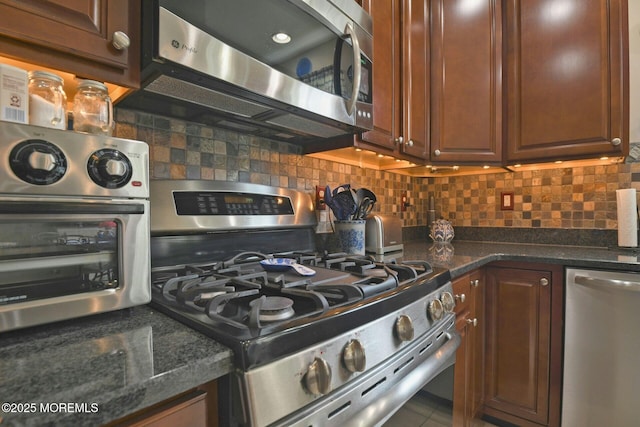 21 Blyth Ln, Jackson, NJ 08527 - kitchen featuring stainless steel appliances, decorative backsplash, and dark stone countertops