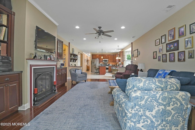 21 Blyth Ln, Jackson, NJ 08527 - living room with recessed lighting, a fireplace, dark wood-type flooring, ceiling fan, and baseboards