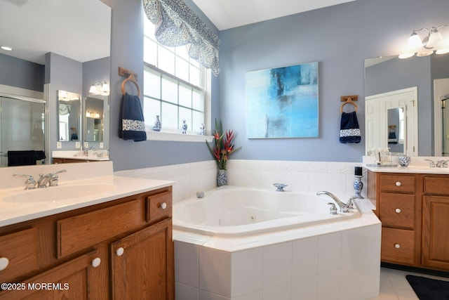 21 Blyth Ln, Jackson, NJ 08527 - bathroom with a shower stall, two vanities, a tub with jets, and tile patterned flooring