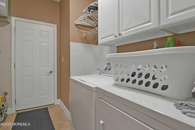 21 Blyth Ln, Jackson, NJ 08527 - laundry area featuring separate washer and dryer, cabinet space, and light tile patterned floors