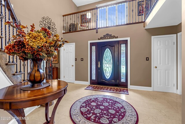 10 Cheryl Ln, Millstone, NJ 08510 - entryway featuring a towering ceiling, stairs, and tile patterned floors