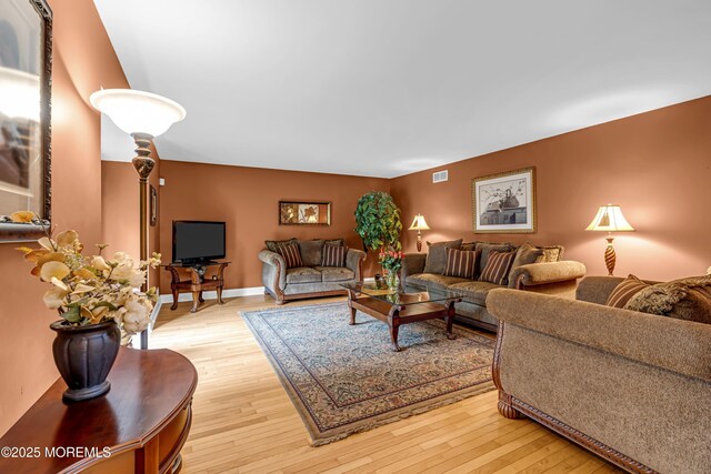 10 Cheryl Ln, Millstone, NJ 08510 - living area featuring light wood-type flooring