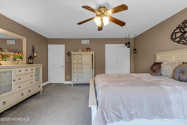 10 Cheryl Ln, Millstone, NJ 08510 - carpeted bedroom featuring a ceiling fan and multiple closets