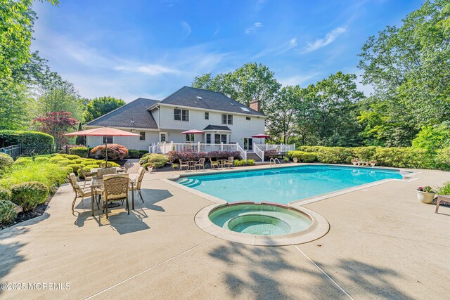10 Cheryl Ln, Millstone, NJ 08510 - view of pool with a deck, a patio, outdoor dining space, and view of wooded area