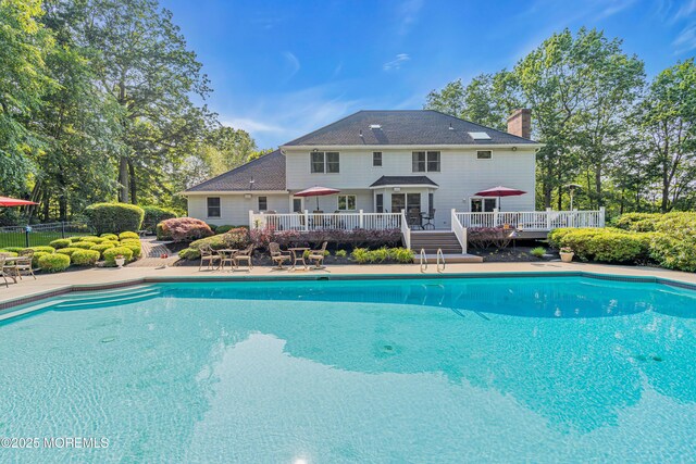 10 Cheryl Ln, Millstone, NJ 08510 - outdoor pool featuring a deck and a patio area