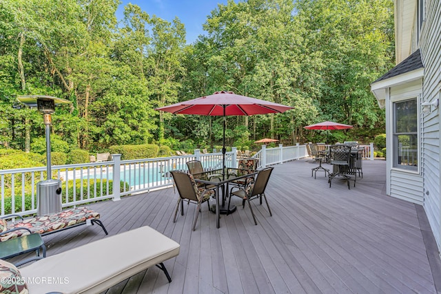 10 Cheryl Ln, Millstone, NJ 08510 - deck with outdoor dining area and view of scattered trees