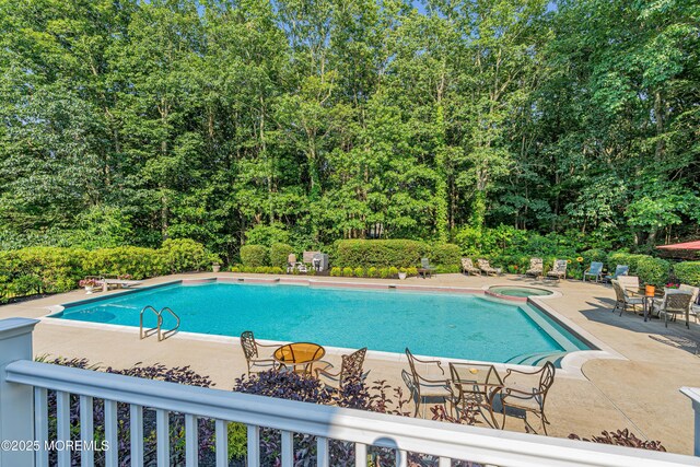 10 Cheryl Ln, Millstone, NJ 08510 - swimming pool featuring an in-ground hot tub and a patio area