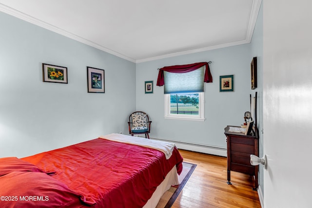 136 Iron Ore Rd, Manalapan, NJ 07726 - bedroom with a baseboard radiator, ornamental molding, and wood finished floors