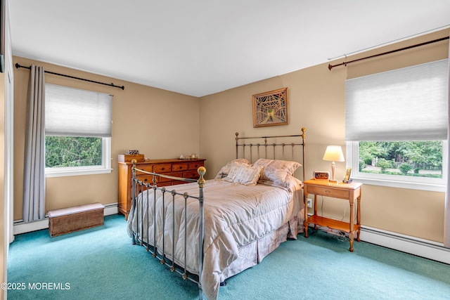 136 Iron Ore Rd, Manalapan, NJ 07726 - carpeted bedroom featuring multiple windows, a baseboard radiator, and a baseboard heating unit