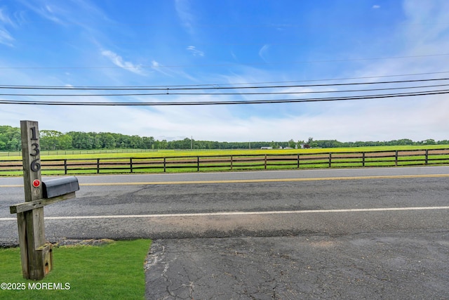 136 Iron Ore Rd, Manalapan, NJ 07726 - view of street featuring a rural view