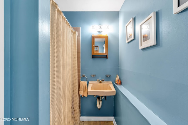 136 Iron Ore Rd, Manalapan, NJ 07726 - bathroom featuring a sink and a shower with curtain