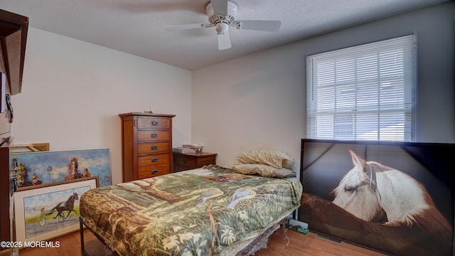 21 Parkview Way, Manalapan, NJ 07726 - bedroom with wood finished floors and a ceiling fan
