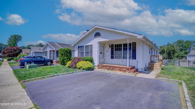 21 Parkview Way, Manalapan, NJ 07726 - view of front of house featuring covered porch
