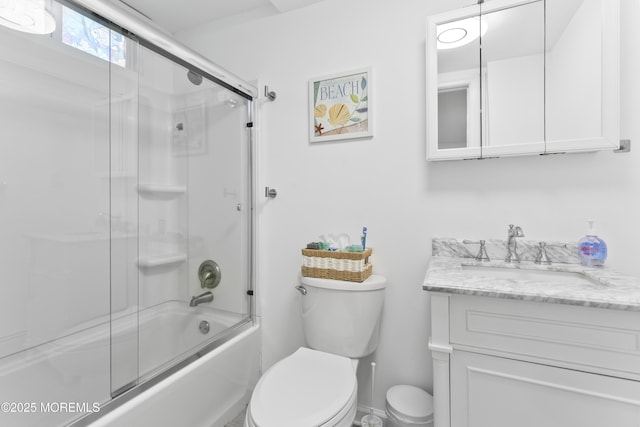 24 Highland Ave, Keansburg, NJ 07734 - bathroom featuring vanity, toilet, and combined bath / shower with glass door