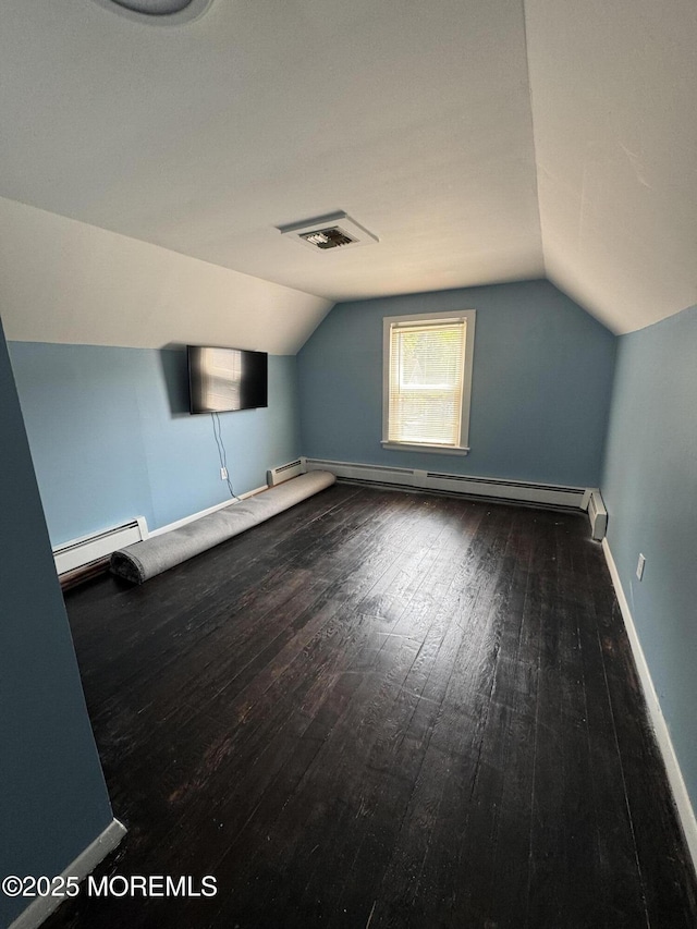 184 Washington Ave, Matawan, NJ 07747 - bonus room with a baseboard radiator, hardwood / wood-style floors, and lofted ceiling