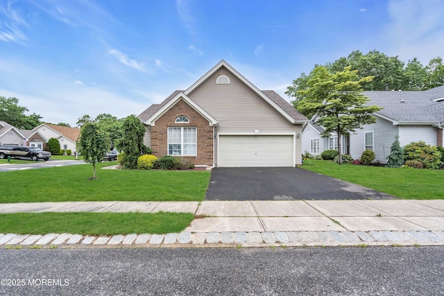 143 Sylvan Lake Blvd, Bayville, NJ 08721 - view of front of home with brick siding, driveway, a front lawn, and a garage