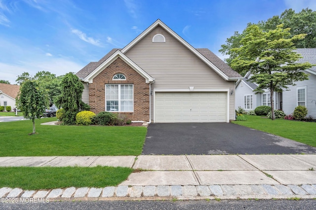 143 Sylvan Lake Blvd, Bayville, NJ 08721 - view of front of property with driveway, brick siding, an attached garage, and a front yard