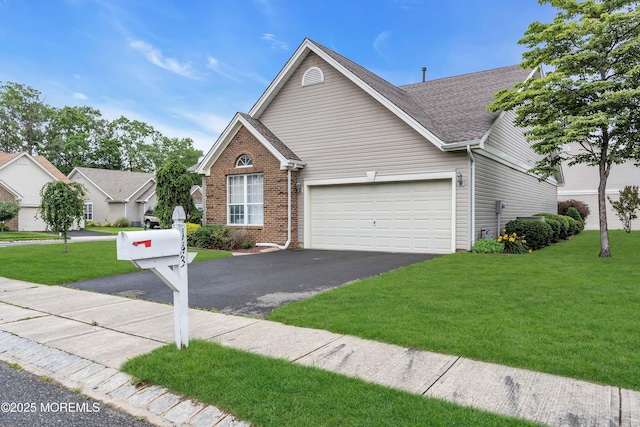 143 Sylvan Lake Blvd, Bayville, NJ 08721 - traditional home with asphalt driveway, a garage, a front lawn, brick siding, and roof with shingles
