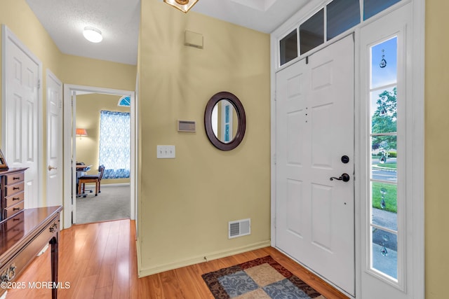 143 Sylvan Lake Blvd, Bayville, NJ 08721 - foyer with light wood-style floors and baseboards