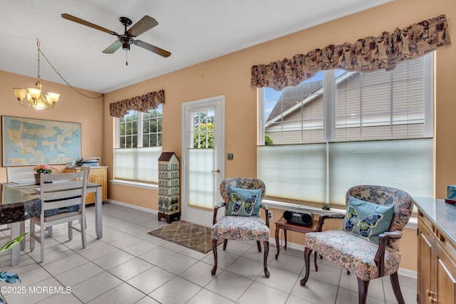 143 Sylvan Lake Blvd, Bayville, NJ 08721 - living area with ceiling fan, light tile patterned flooring, lofted ceiling, and a chandelier