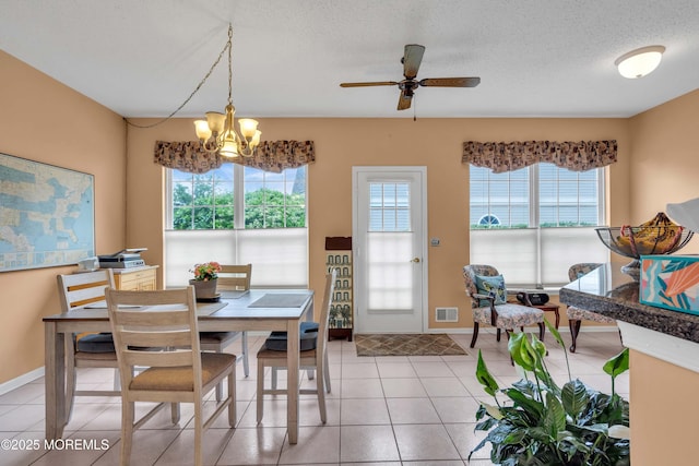 143 Sylvan Lake Blvd, Bayville, NJ 08721 - dining space with a chandelier, a ceiling fan, and light tile patterned flooring