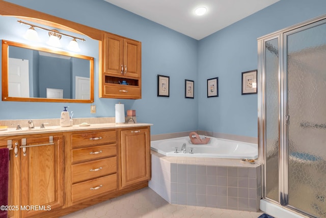 143 Sylvan Lake Blvd, Bayville, NJ 08721 - bathroom with tile patterned floors, vanity, a bath, and a shower stall