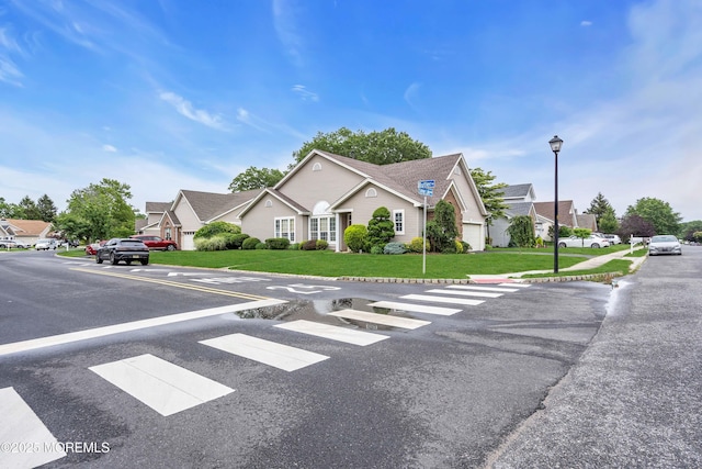 143 Sylvan Lake Blvd, Bayville, NJ 08721 - view of front of house with uncovered parking, a residential view, and a front lawn
